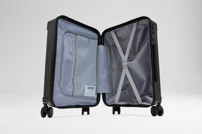 VALISE RIGIDE DE VOYAGE À ROULETTES