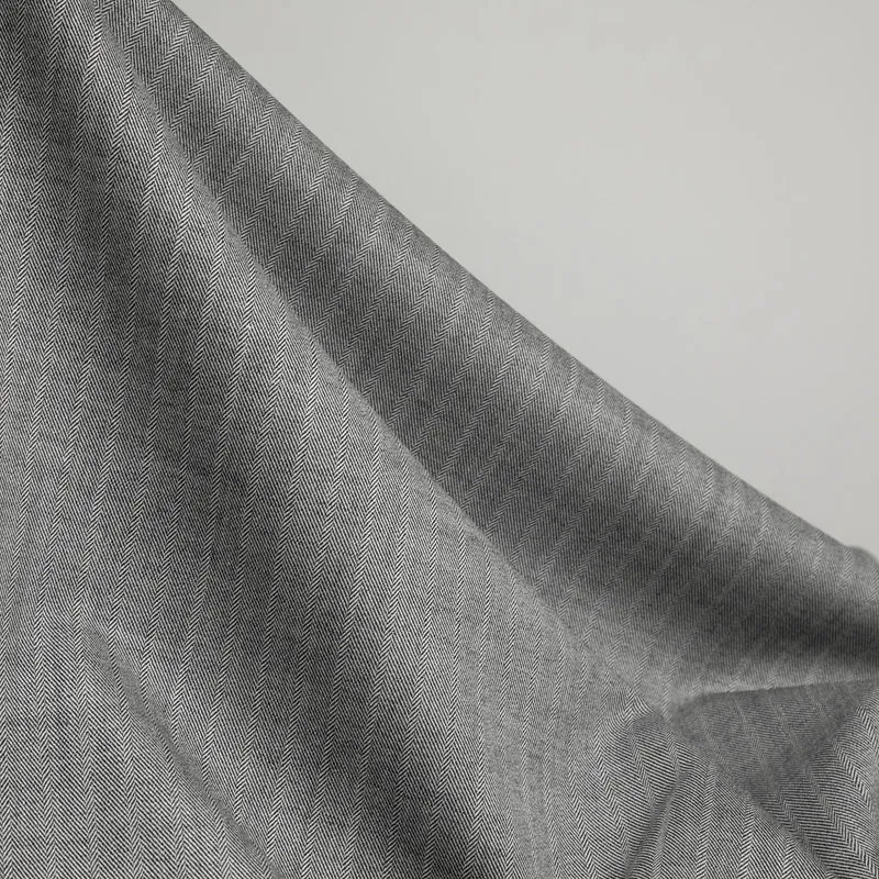 Tissu pour manteau en mélange de laine | Chevrons noir & ivoire