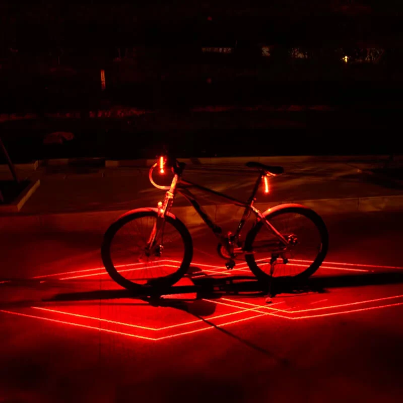 LaserSpotlight™ | Feu arriere velo avec laser pour sécurité nocturne optimale